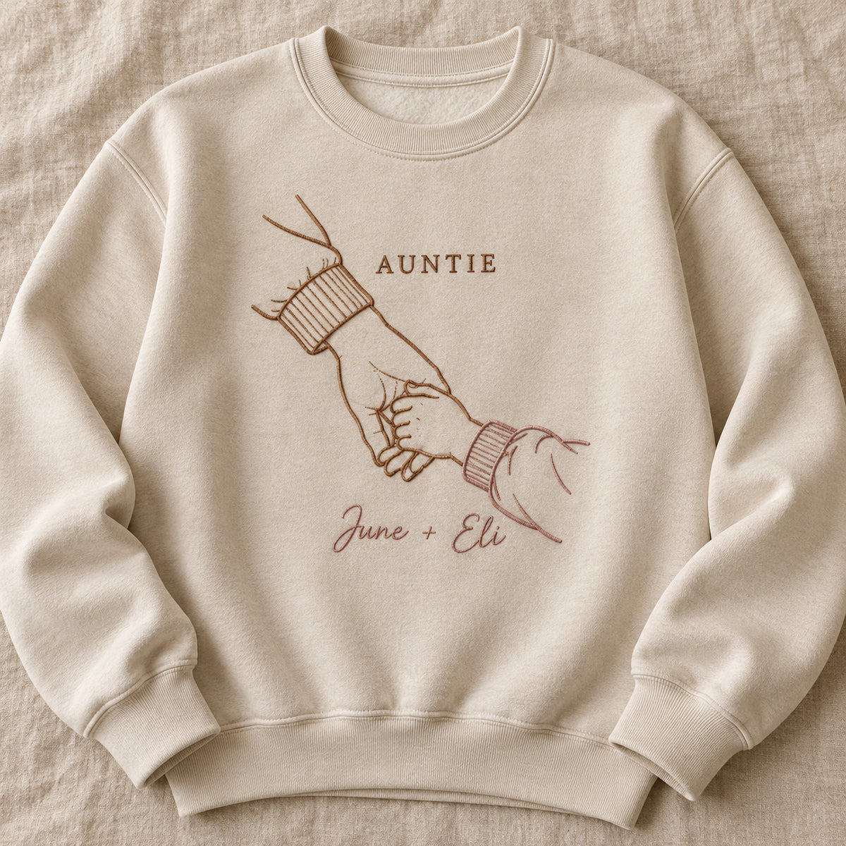 Walking Together personalized Auntie hands design; Beige sweatshirt mockup, hero; sample text AUNTIE / June + Eli