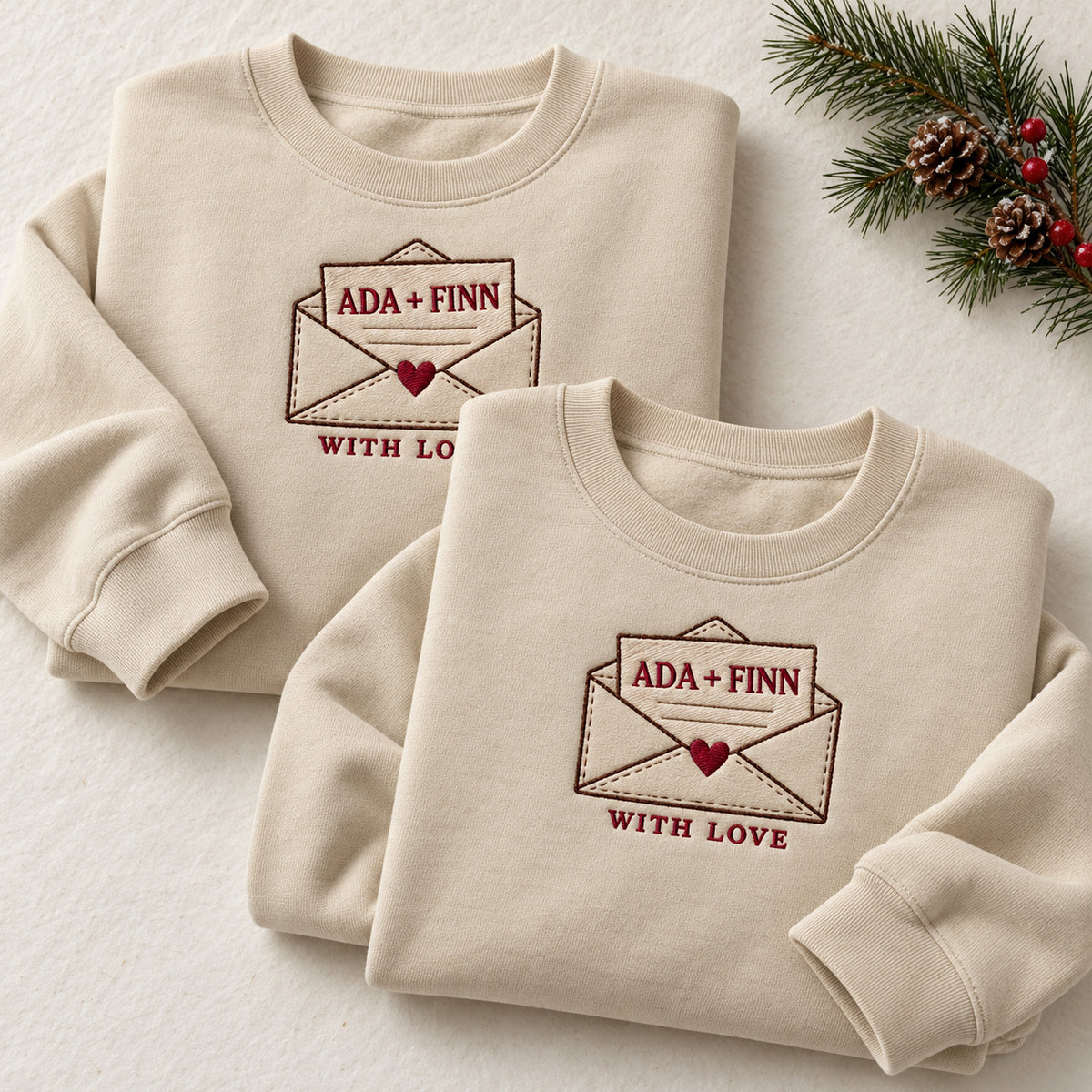 With Love Letter sweatshirt concept mockup featuring a personalized love letter in a heart-sealed envelope, sample personalization ADA + FINN, hero view