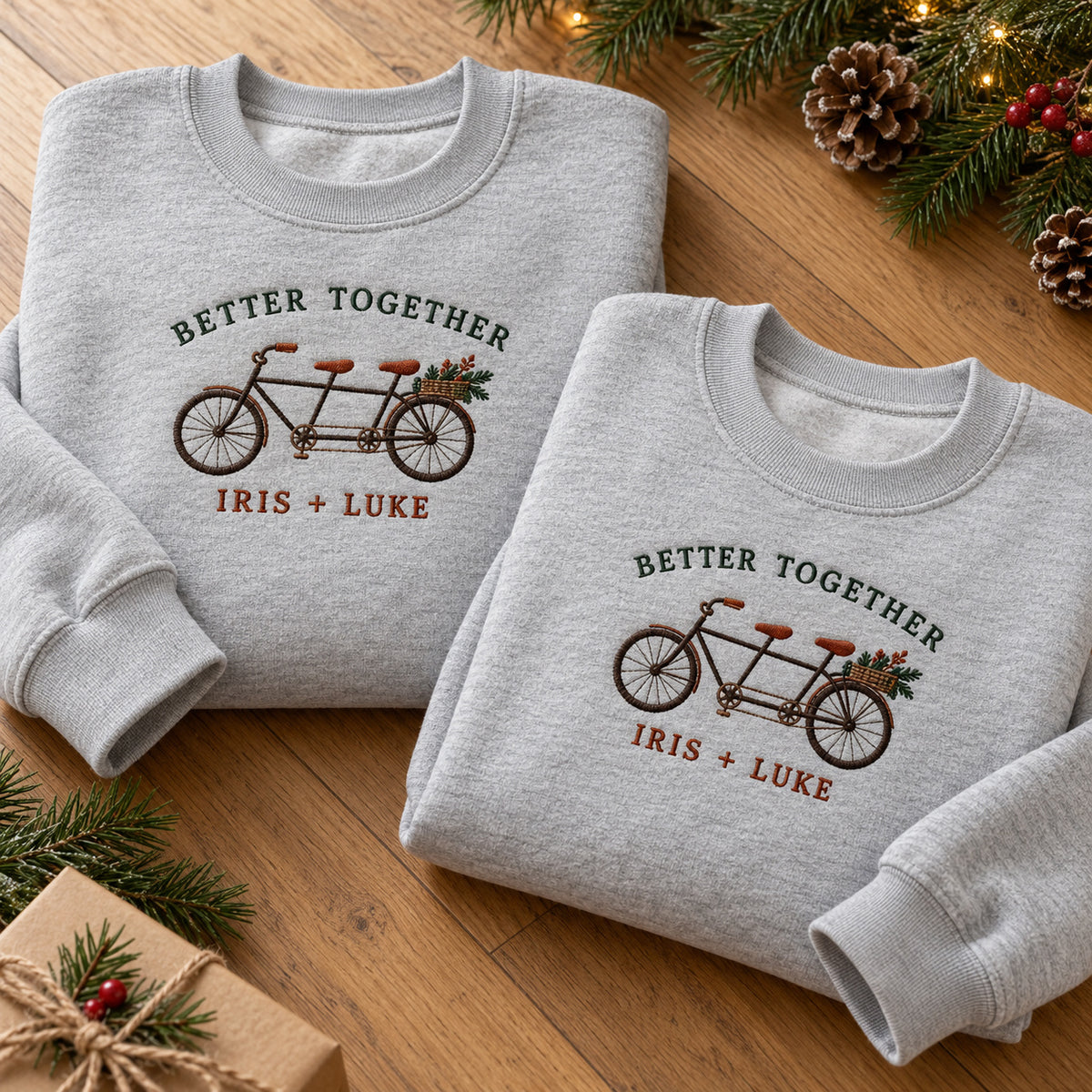 Better Together Bicycle sweatshirt concept mockup featuring a tandem bicycle with flowers, sample personalization IRIS + LUKE, hero view