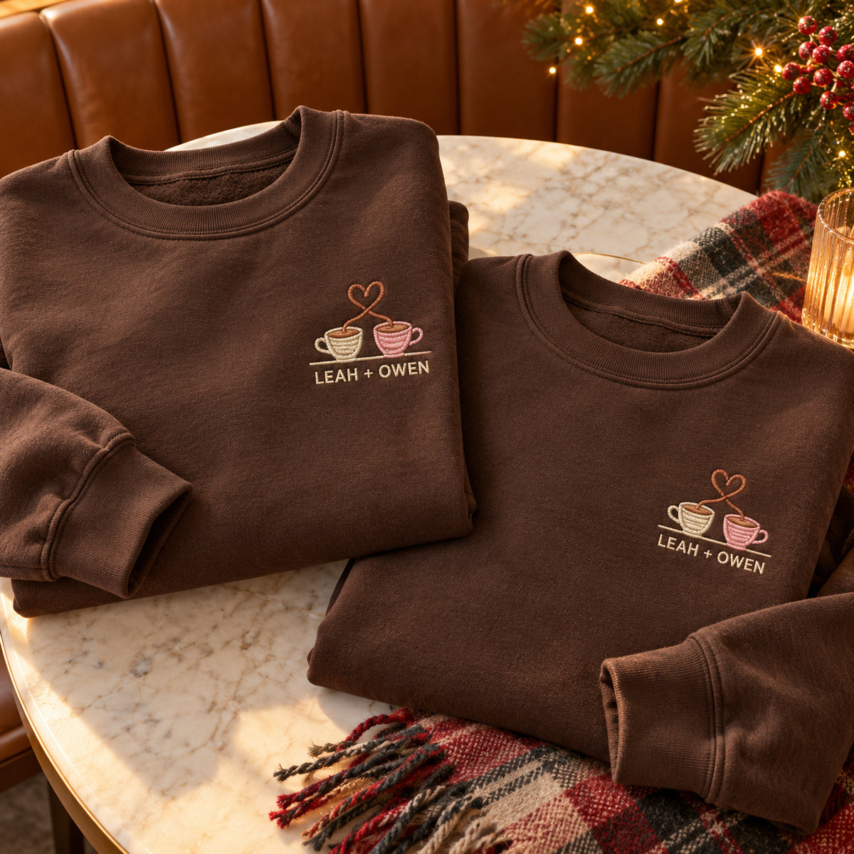 Coffee Date sweatshirt concept mockup featuring two coffee cups with heart-shaped steam, sample personalization LEAH + OWEN, hero view