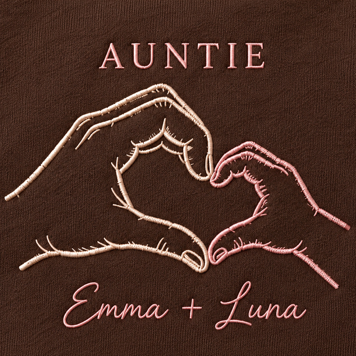 Tiny Hand Heart personalized Auntie hands design; Chocolate sweatshirt mockup, embroidery detail; sample text AUNTIE / Emma + Luna