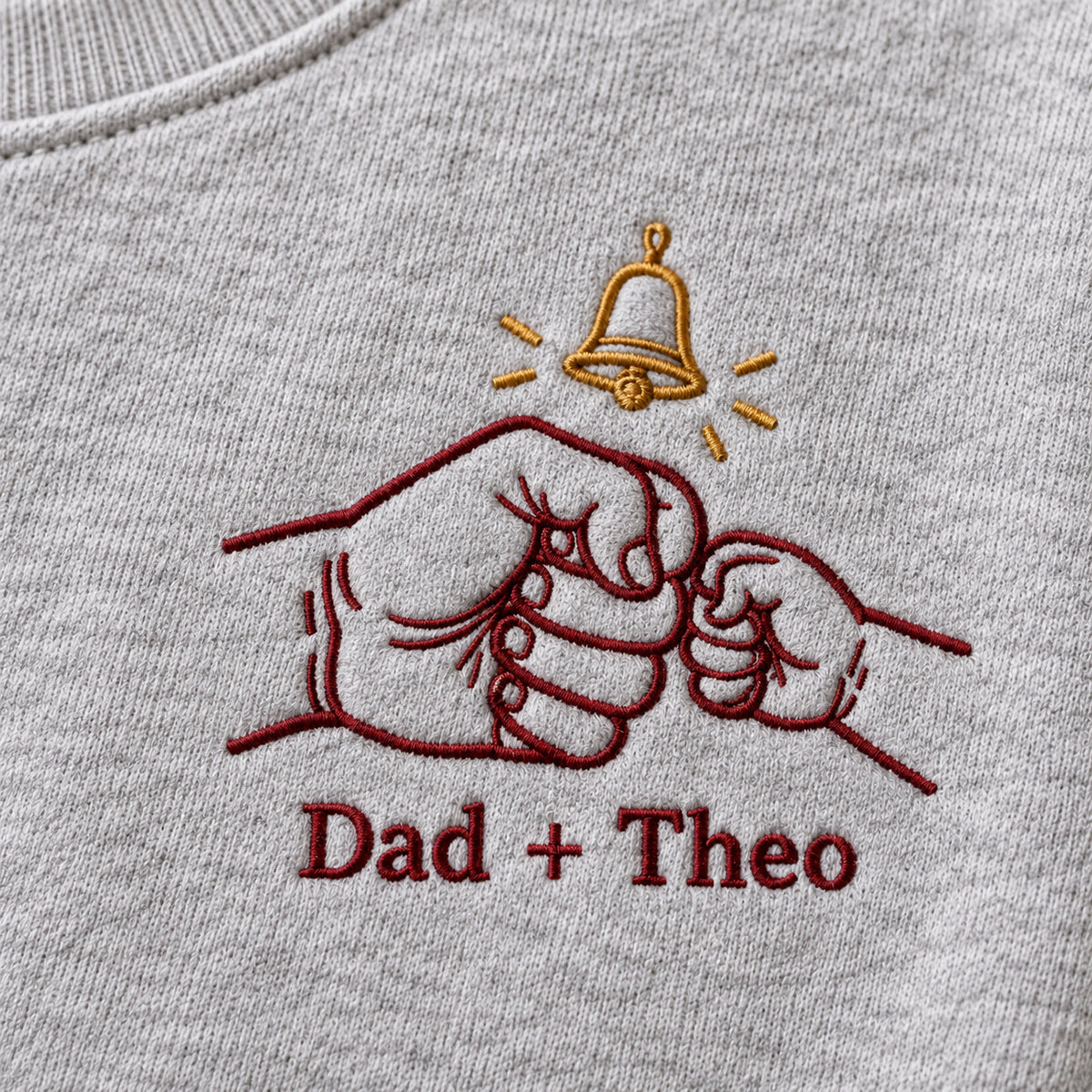 Tiny Bell Promise personalized Christmas hands design; Ash sweatshirt mockup, embroidery detail; sample text Dad + Theo