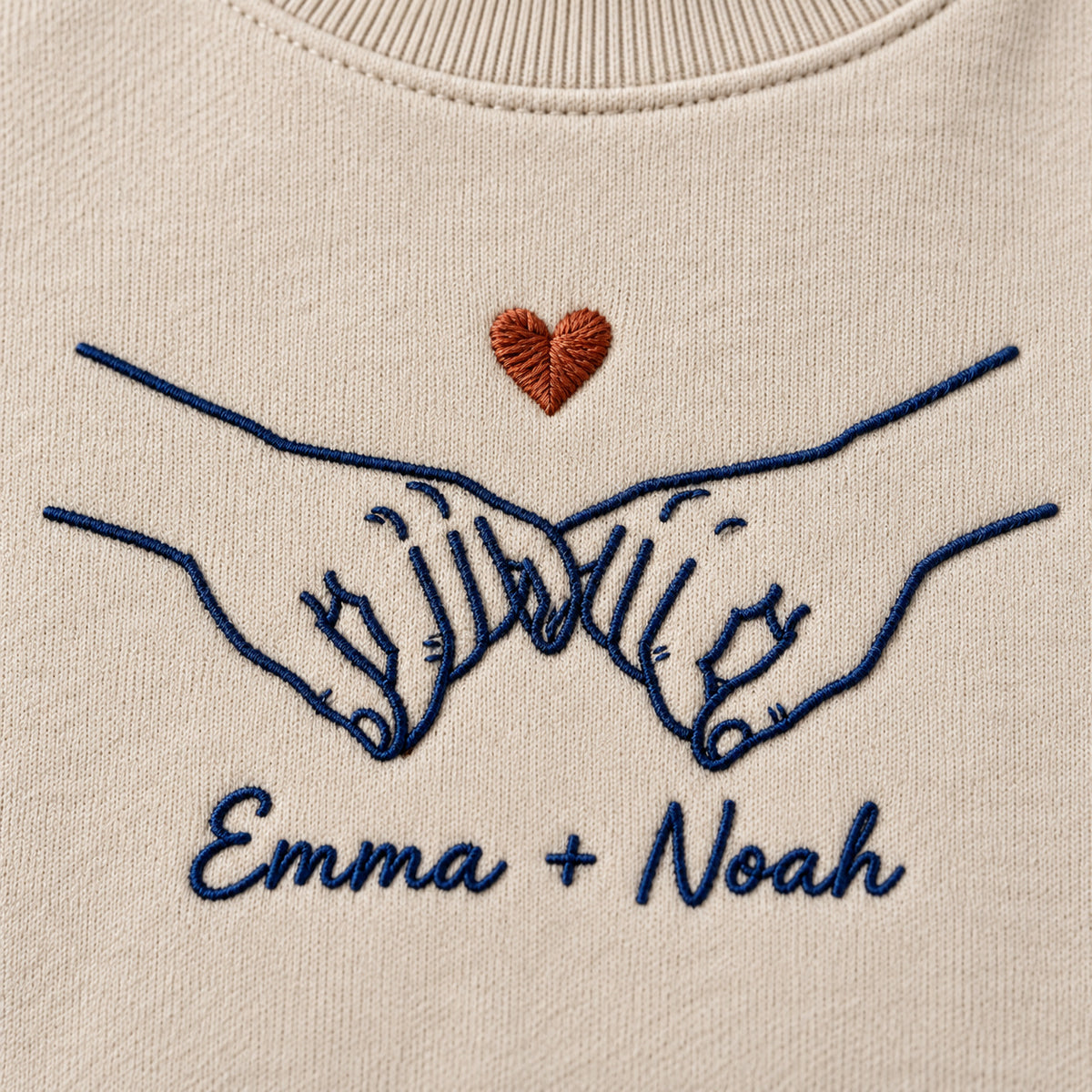 Pinky Promise personalized Couples hands design; Sand sweatshirt mockup, embroidery detail; sample text Emma + Noah