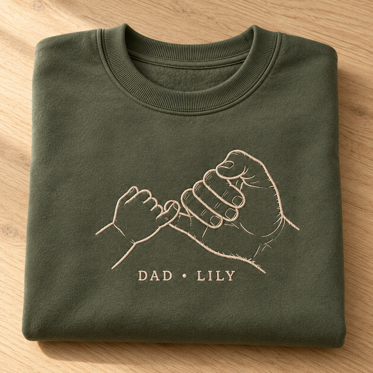 Pinky Promise personalized Dad hands design; Military Green sweatshirt mockup, personalization detail; sample text DAD • LILY