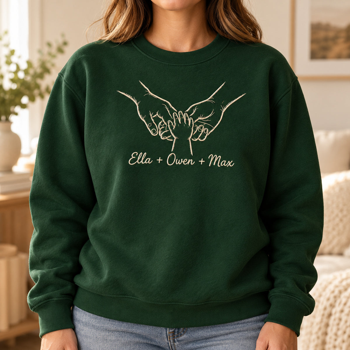 Together Always personalized Family hands design; Forest Green sweatshirt mockup, lifestyle; sample text Ella + Owen + Max