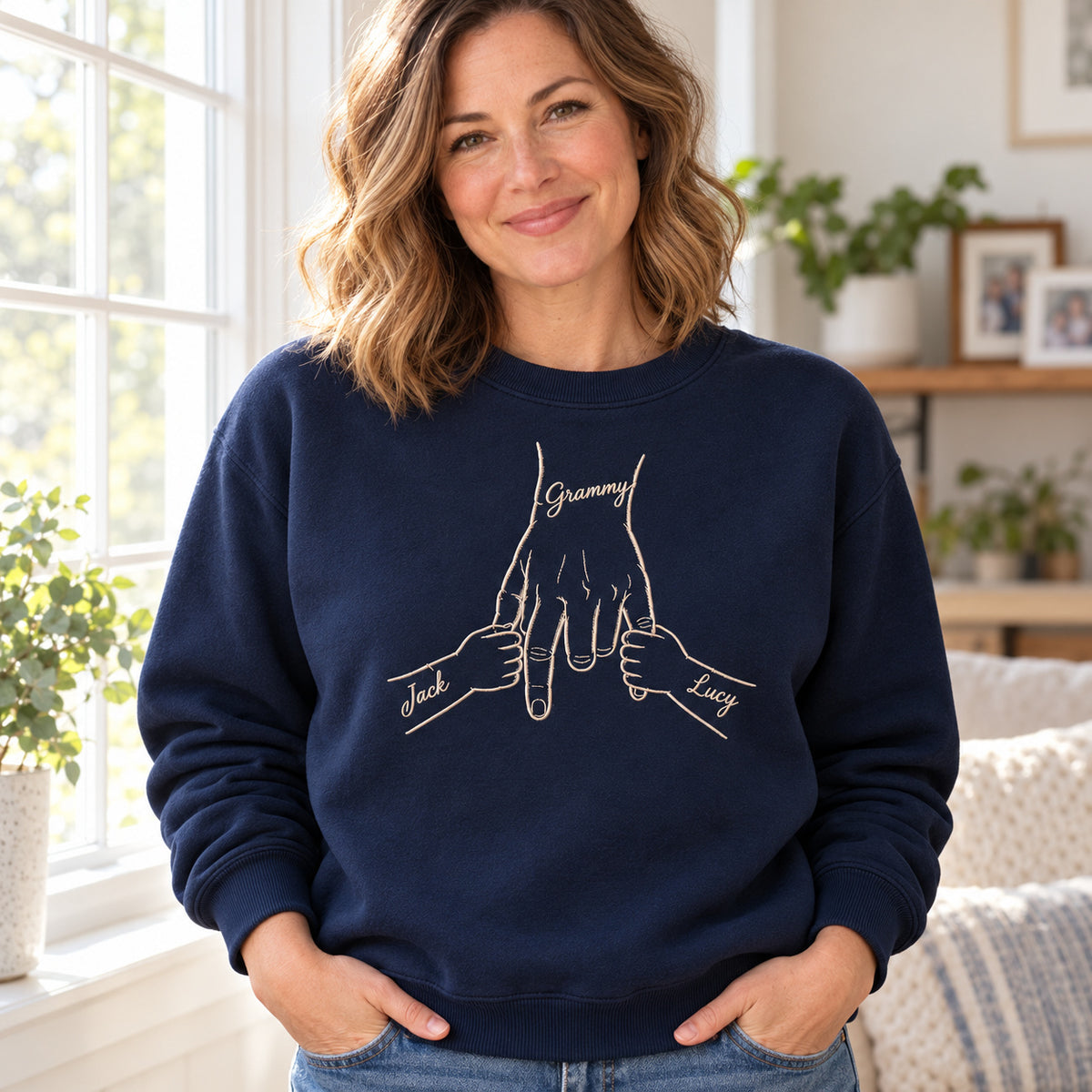 Two Little Treasures personalized Grandma hands design; Navy sweatshirt mockup, lifestyle; sample text Grammy / Jack / Lucy