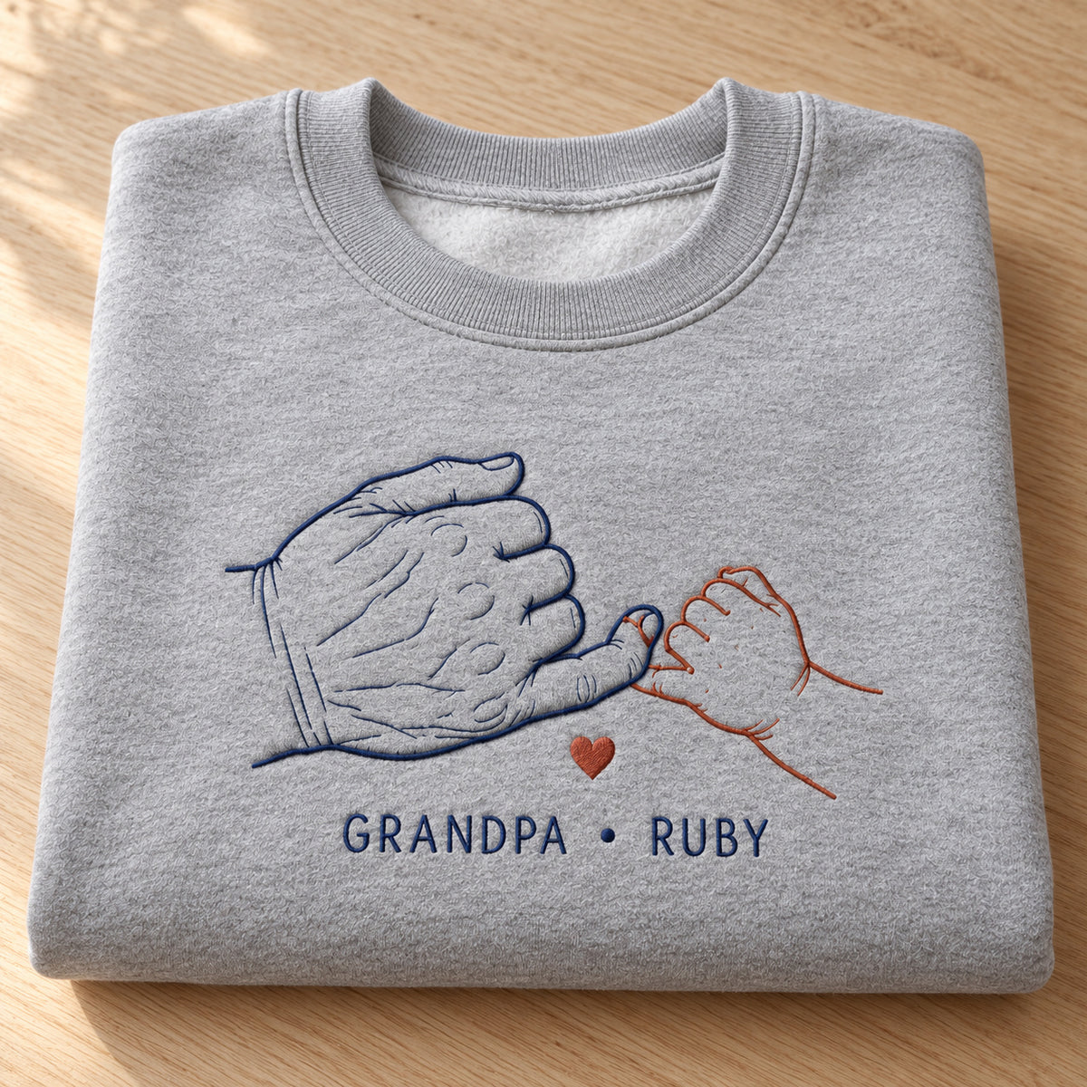 Forever Promise personalized Grandpa hands design; Sport Grey sweatshirt mockup, personalization detail; sample text GRANDPA • RUBY