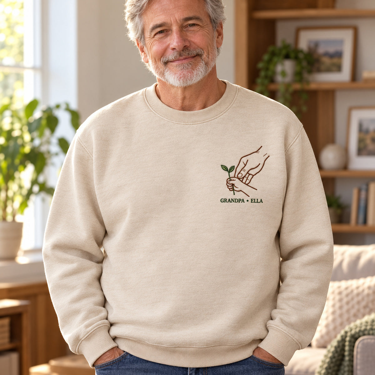 Growing Together personalized Grandpa hands design; Beige sweatshirt mockup, lifestyle; sample text GRANDPA • ELLA