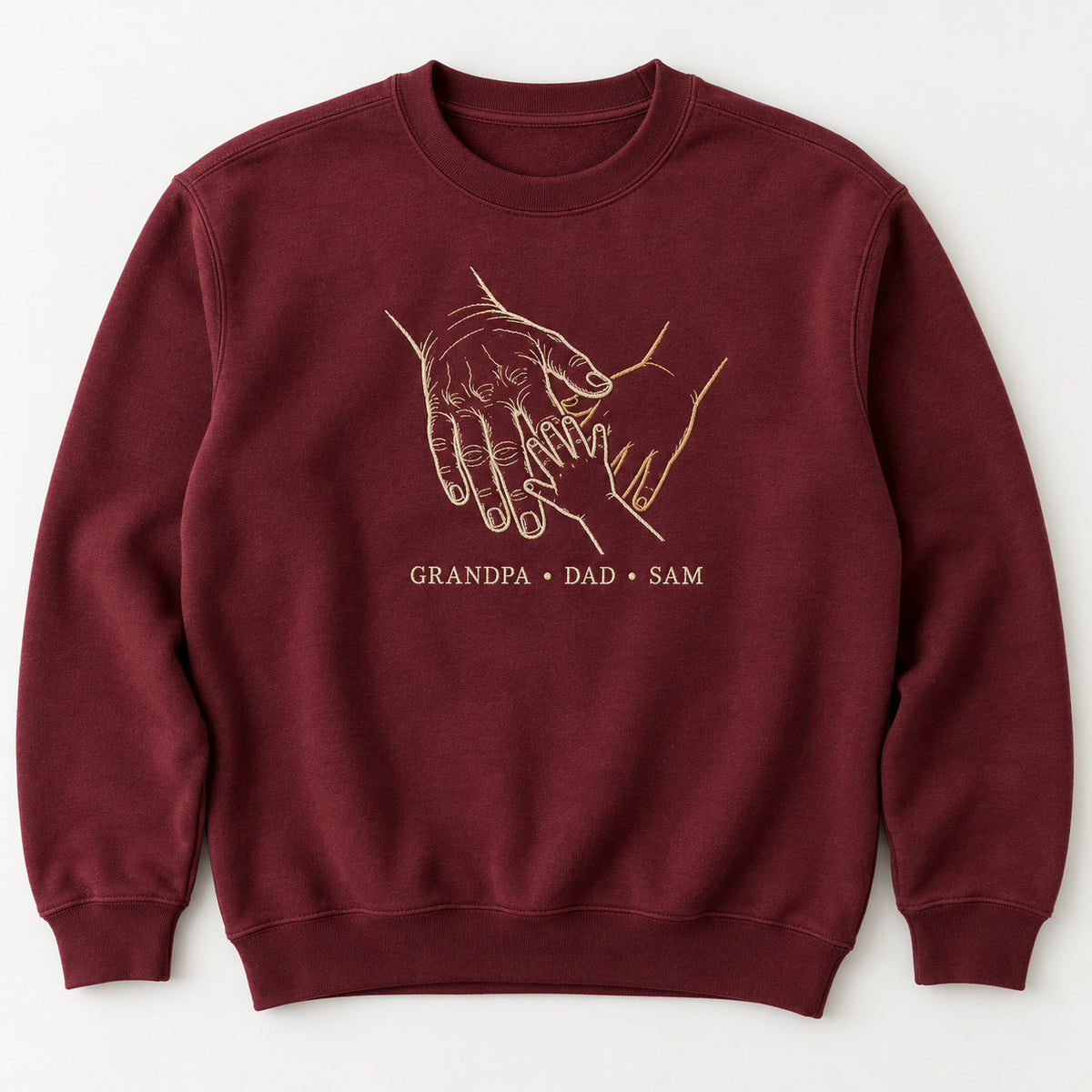 Three Generations personalized Grandpa hands design; Maroon sweatshirt mockup, hero; sample text GRANDPA • DAD • SAM