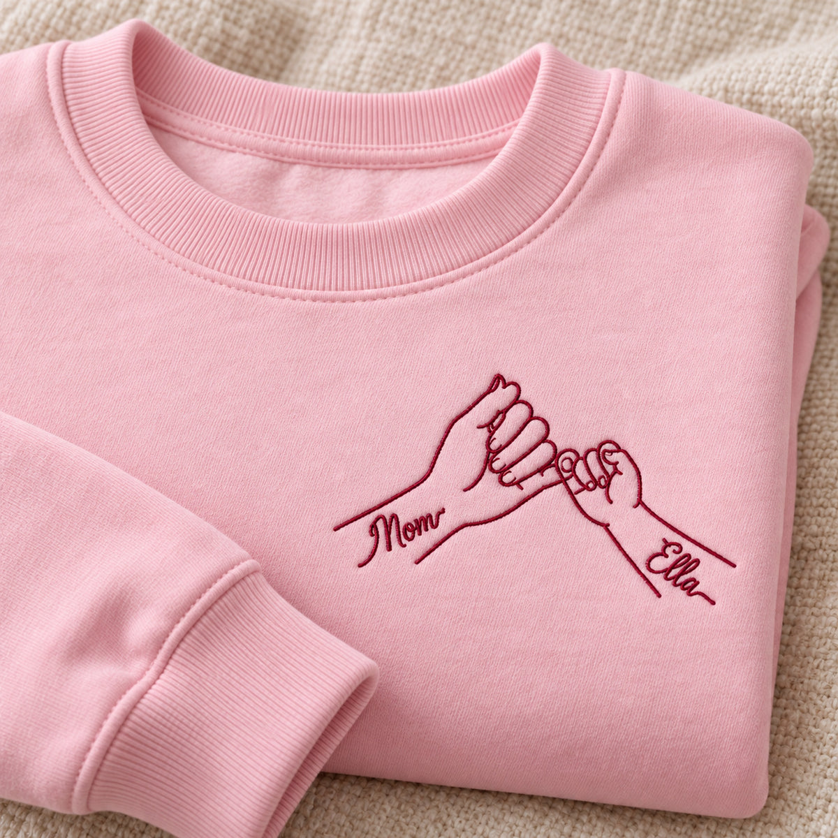 Pinky Promise personalized Mom hands design; Light Pink sweatshirt mockup, personalization detail; sample text Mom / Ella