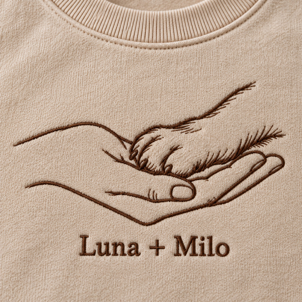 Paw In My Palm personalized Pet_Lover hands design; Sand sweatshirt mockup, embroidery detail; sample text Luna + Milo