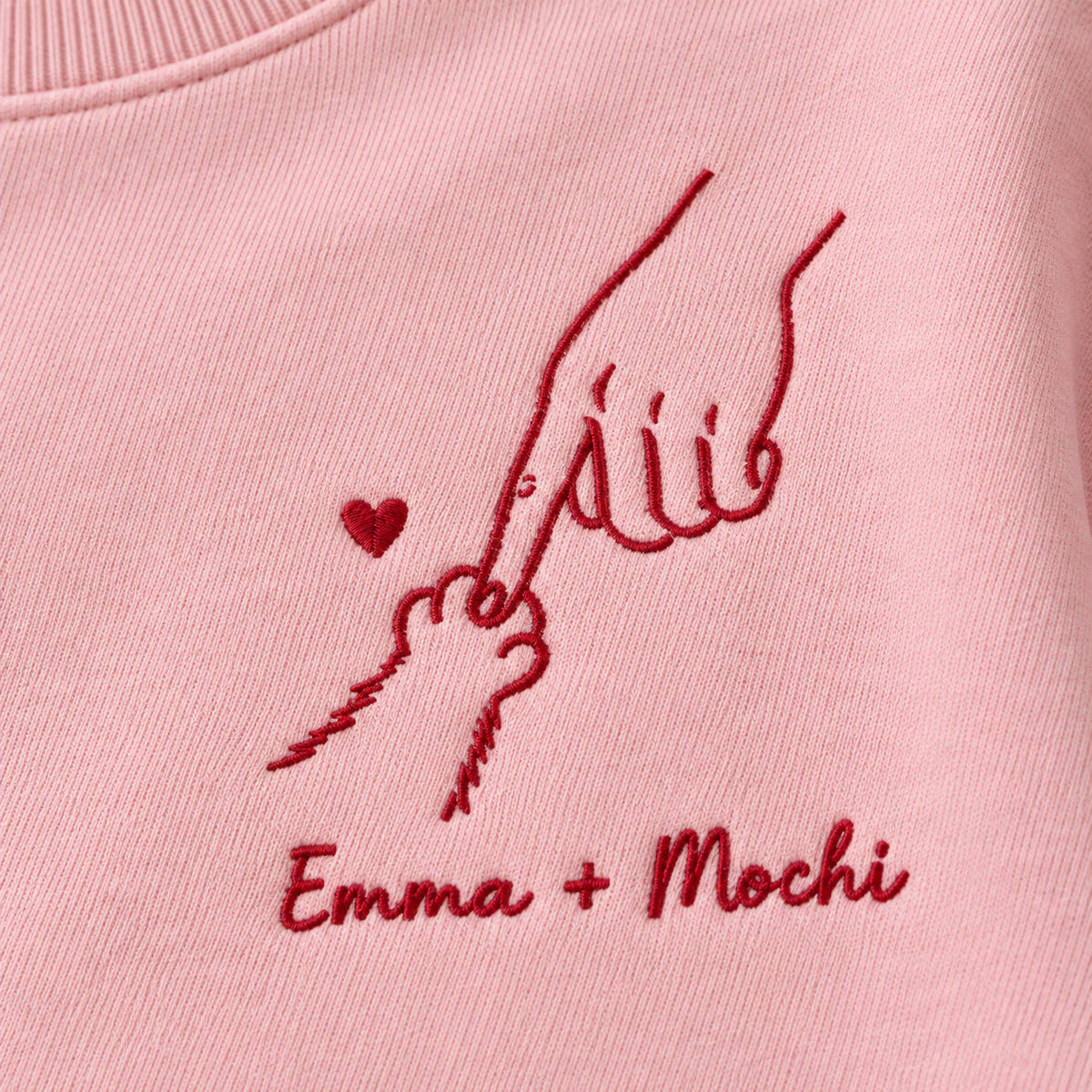 Little Paw Big Love personalized Pet_Lover hands design; Light Pink sweatshirt mockup, embroidery detail; sample text Emma + Mochi