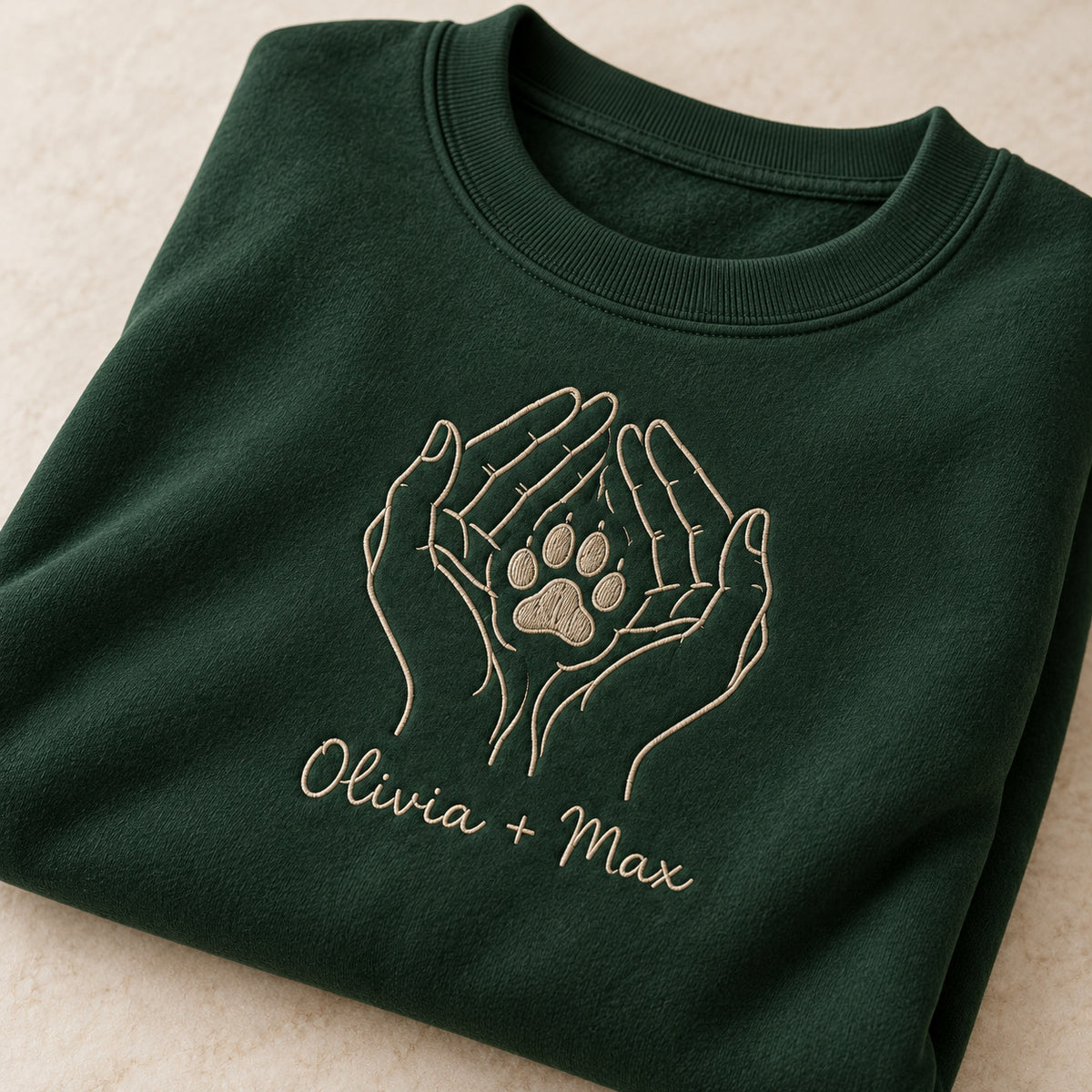 Hands Around Your Paw personalized Pet_Lover hands design; Forest Green sweatshirt mockup, personalization detail; sample text Olivia + Max