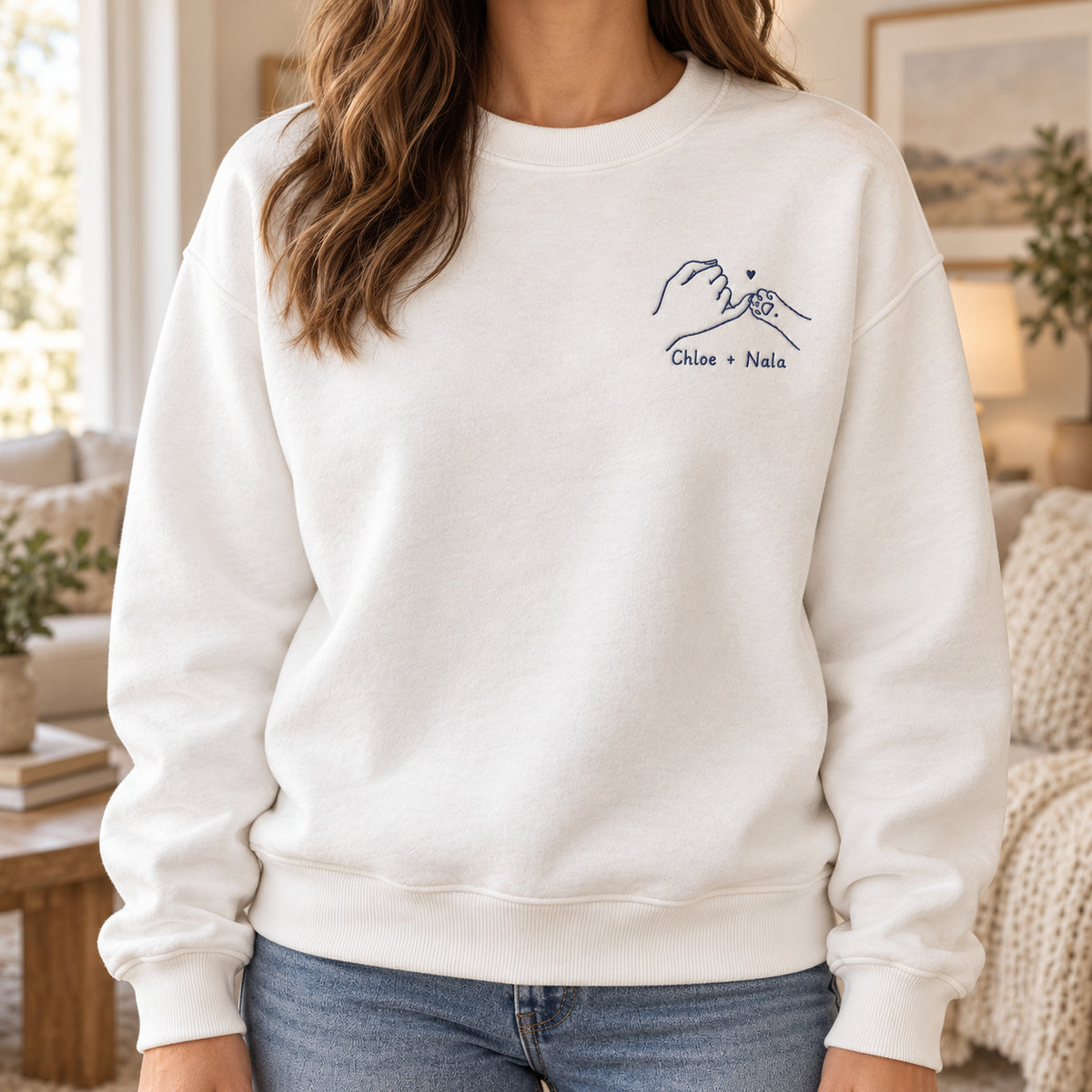 Forever Pinky Paw personalized Pet_Lover hands design; White sweatshirt mockup, lifestyle; sample text Chloe + Nala