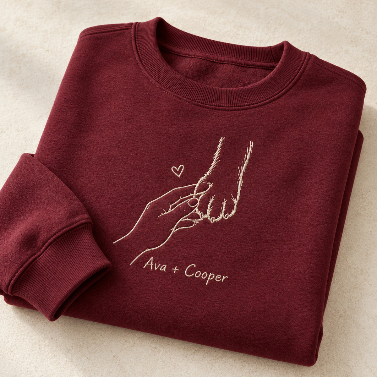 Gentle Touch Bond personalized Pet_Lover hands design; Maroon sweatshirt mockup, personalization detail; sample text Ava + Cooper