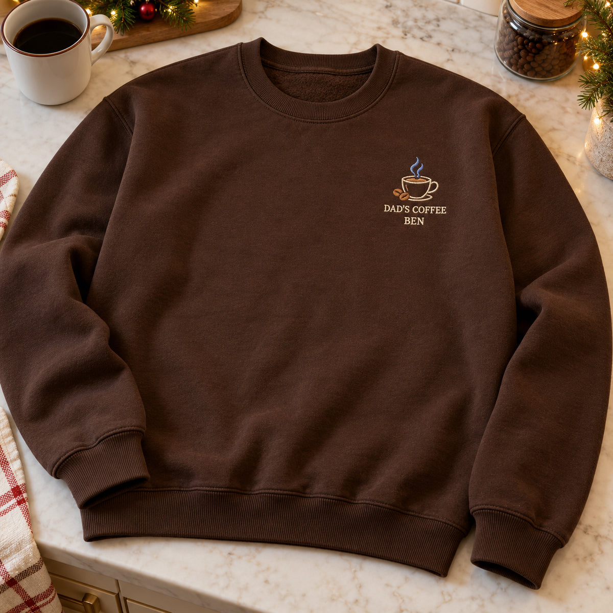Dad's Coffee sweatshirt concept mockup featuring a steaming coffee cup with coffee beans, sample personalization BEN, hero view