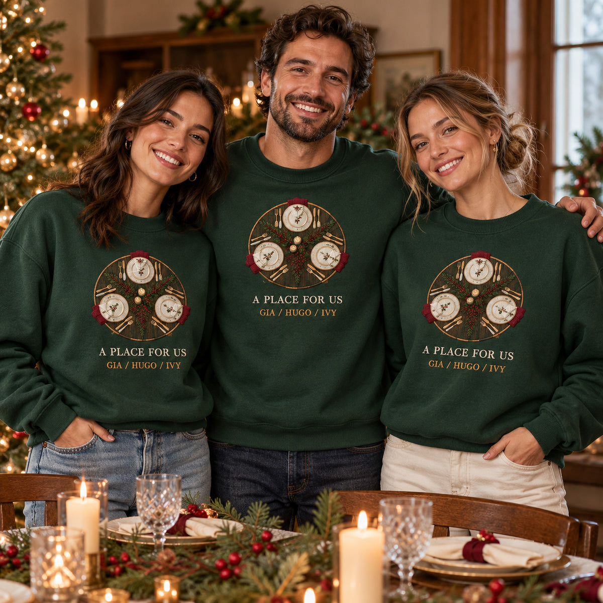 Family Table sweatshirt concept mockup featuring a round table setting with three places and seasonal greenery, sample personalization GIA / HUGO / IVY, lifestyle view