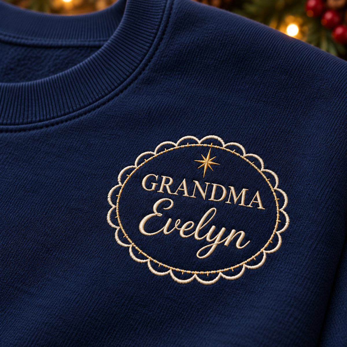 Grandma's Memory Frame sweatshirt concept mockup featuring an ornate oval frame and small star, sample personalization Evelyn, embroidery view