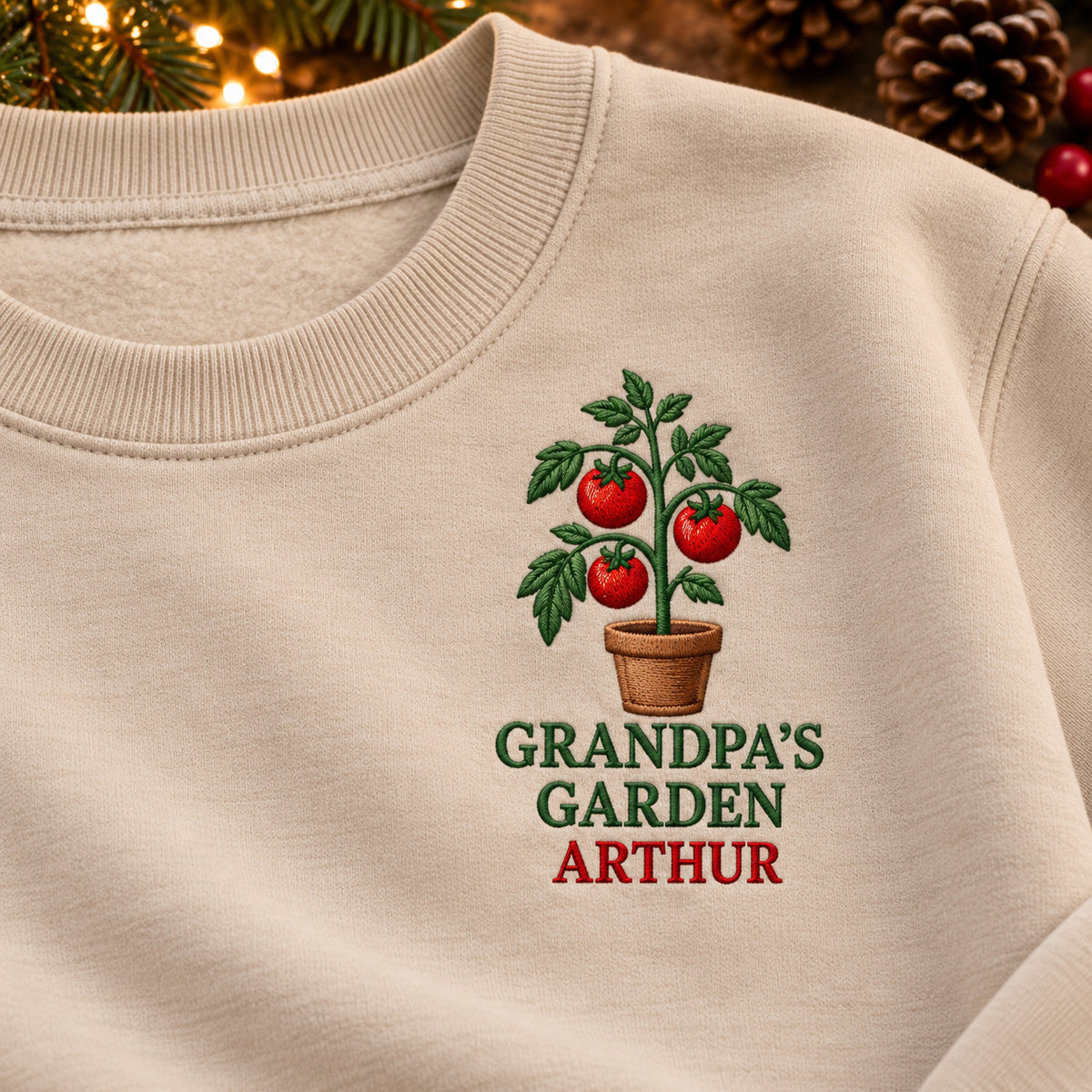 Grandpa's Tomato Garden sweatshirt concept mockup featuring a potted tomato plant, sample personalization ARTHUR, embroidery view