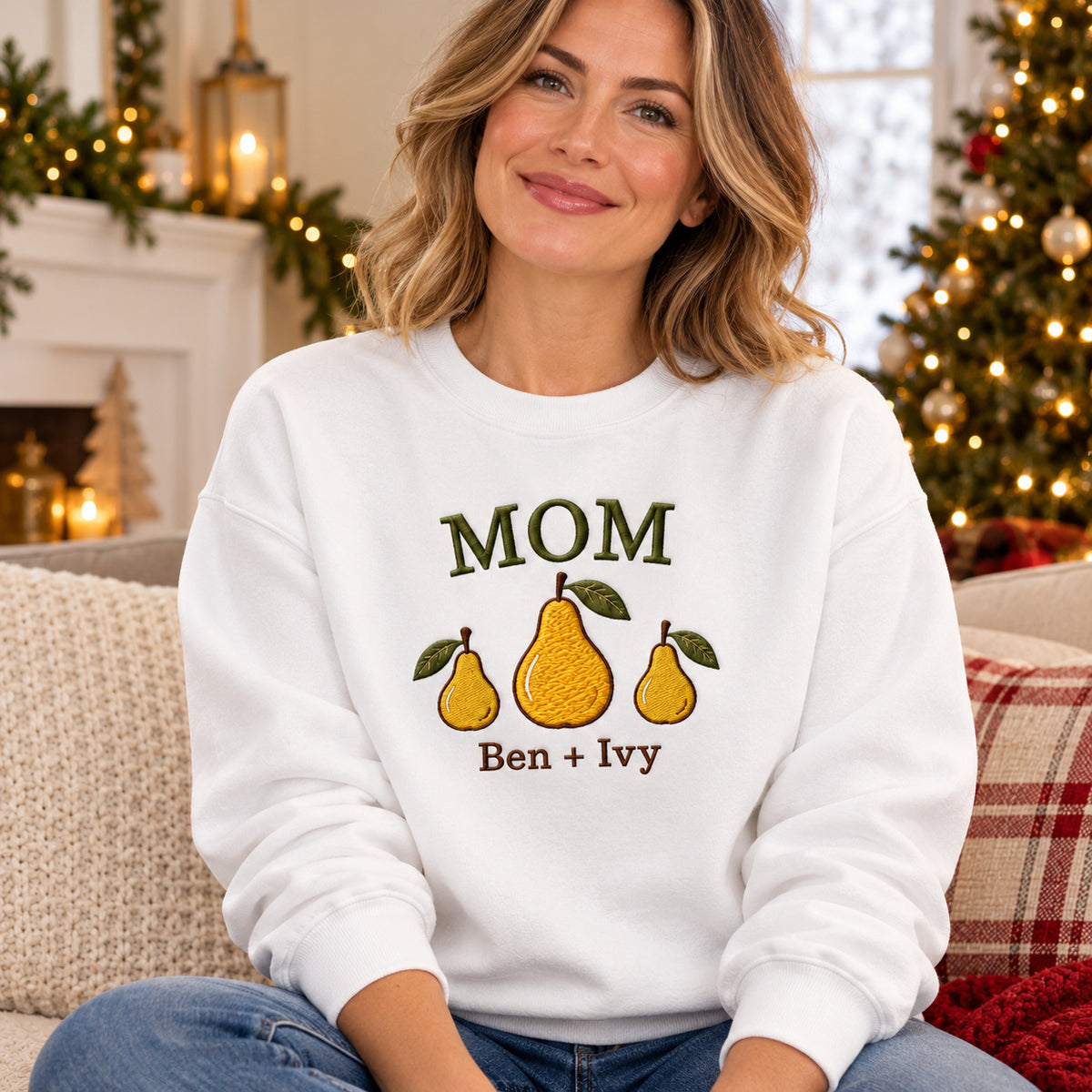Mom and Two Pears sweatshirt concept mockup featuring a large pear between two smaller pears, sample personalization Ben + Ivy, lifestyle view