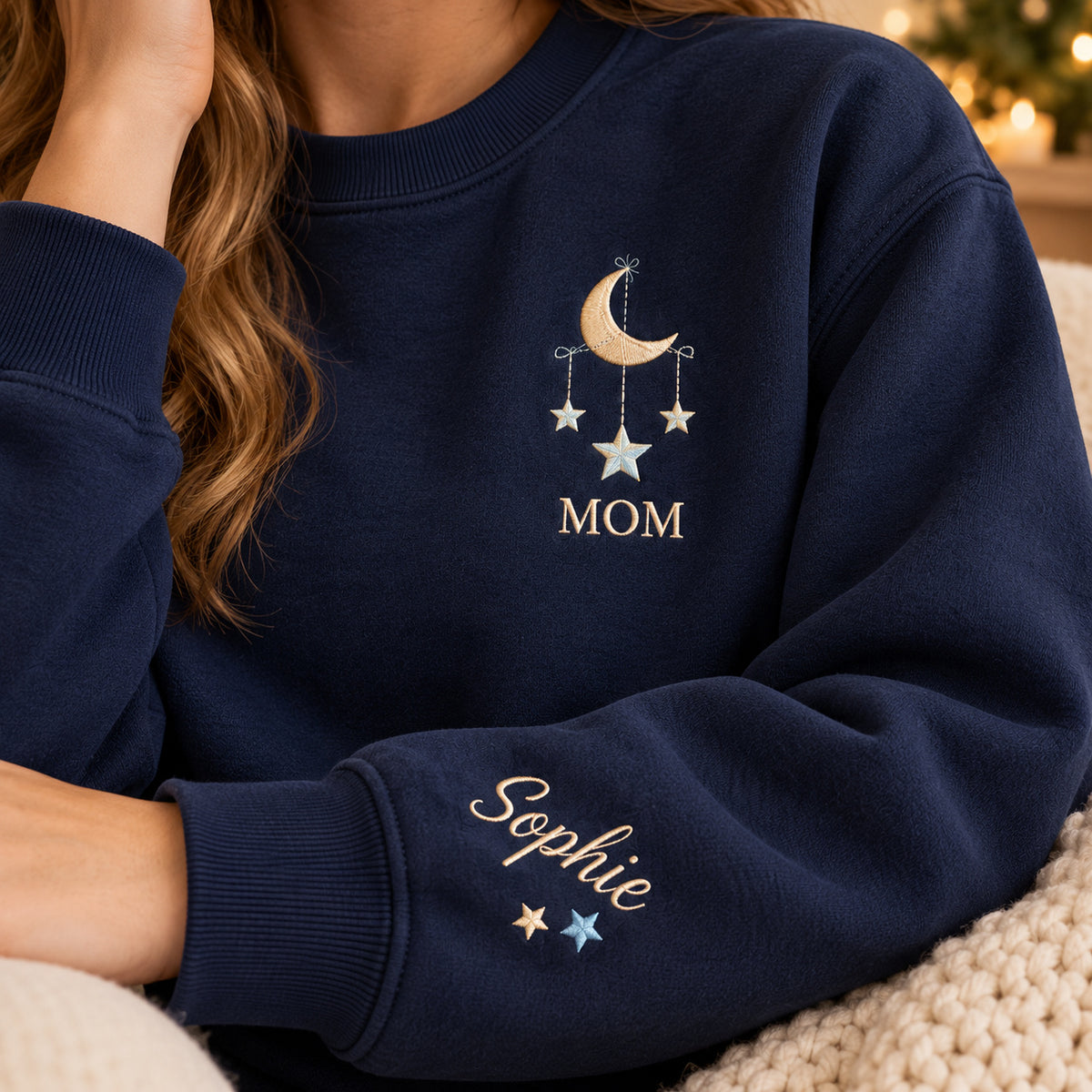 Mom's Sky sweatshirt concept mockup featuring a crescent moon with three hanging stars, sample personalization Sophie, personalization view