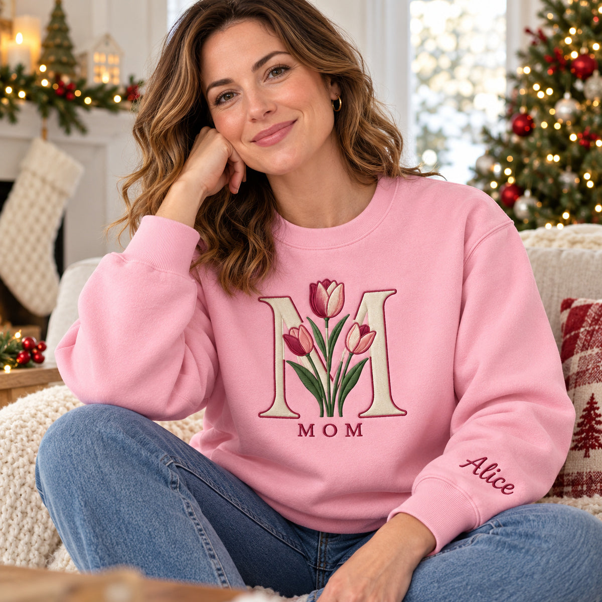 Mom's Tulip sweatshirt concept mockup featuring tulips framed by a large letter M, sample personalization Alice, lifestyle view