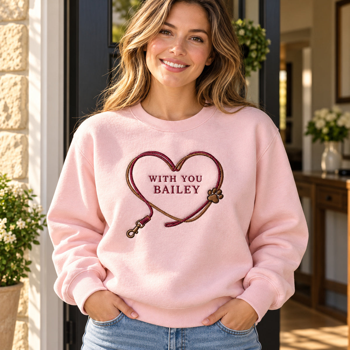 Heart Leash sweatshirt concept mockup featuring a pet leash forming a heart around personalized lettering, sample personalization BAILEY, lifestyle view